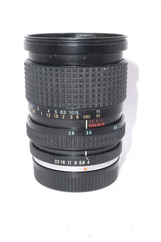 Tokina 70mm macro zoom - f/4,